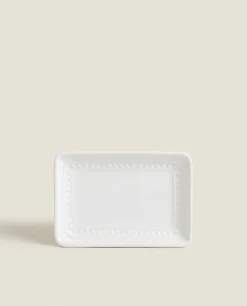 Ceramic Soap Dispenser With A Raised Design