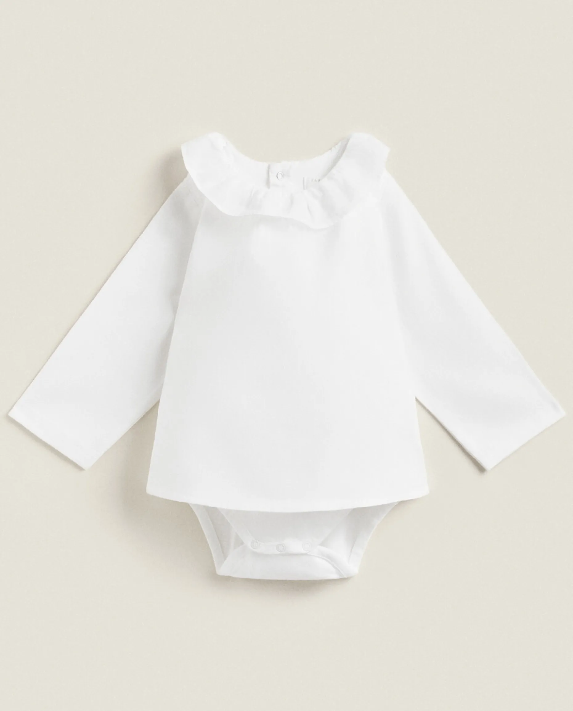 Cotton Bodysuit With Ruffled Neckline