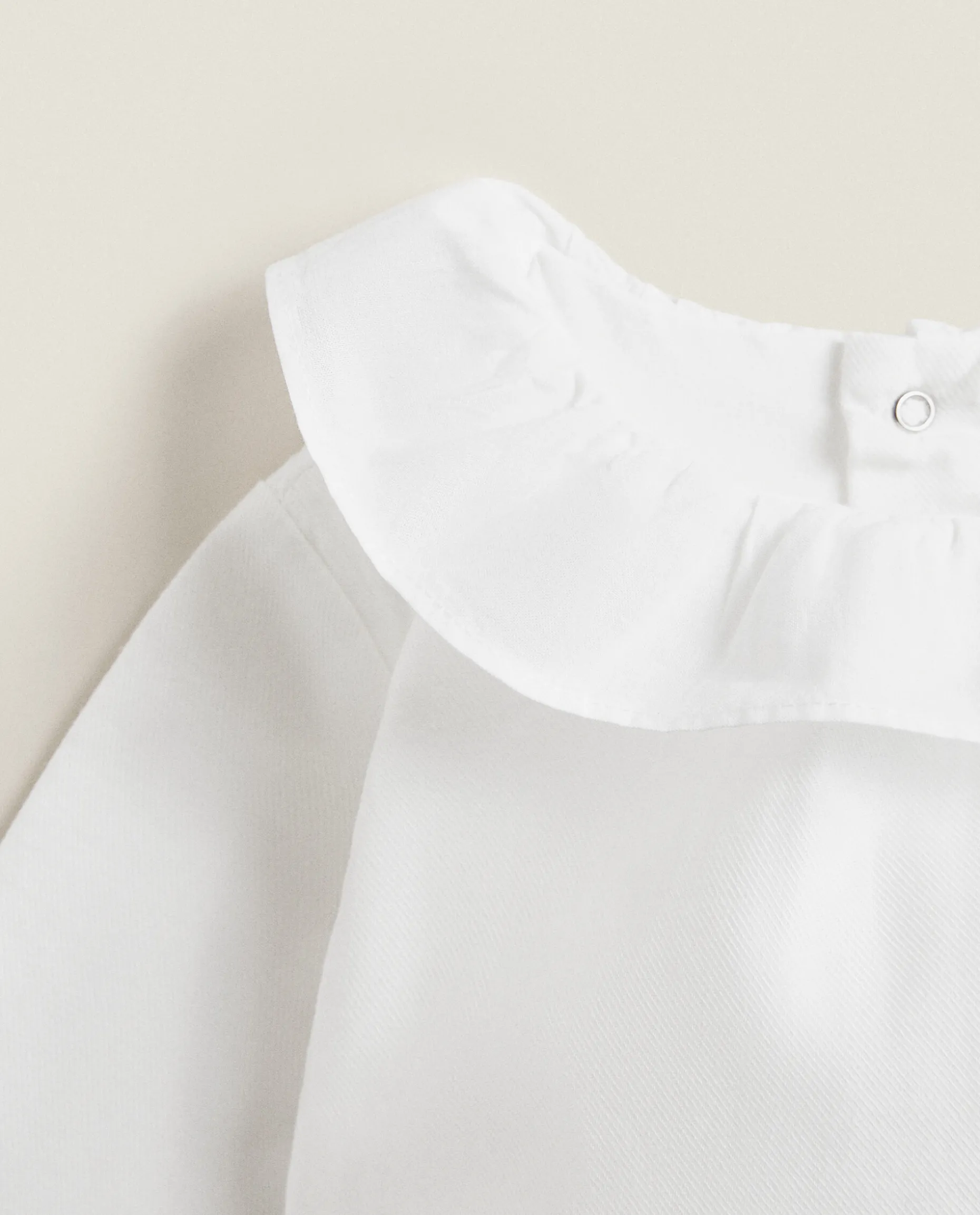 Cotton Bodysuit With Ruffled Neckline