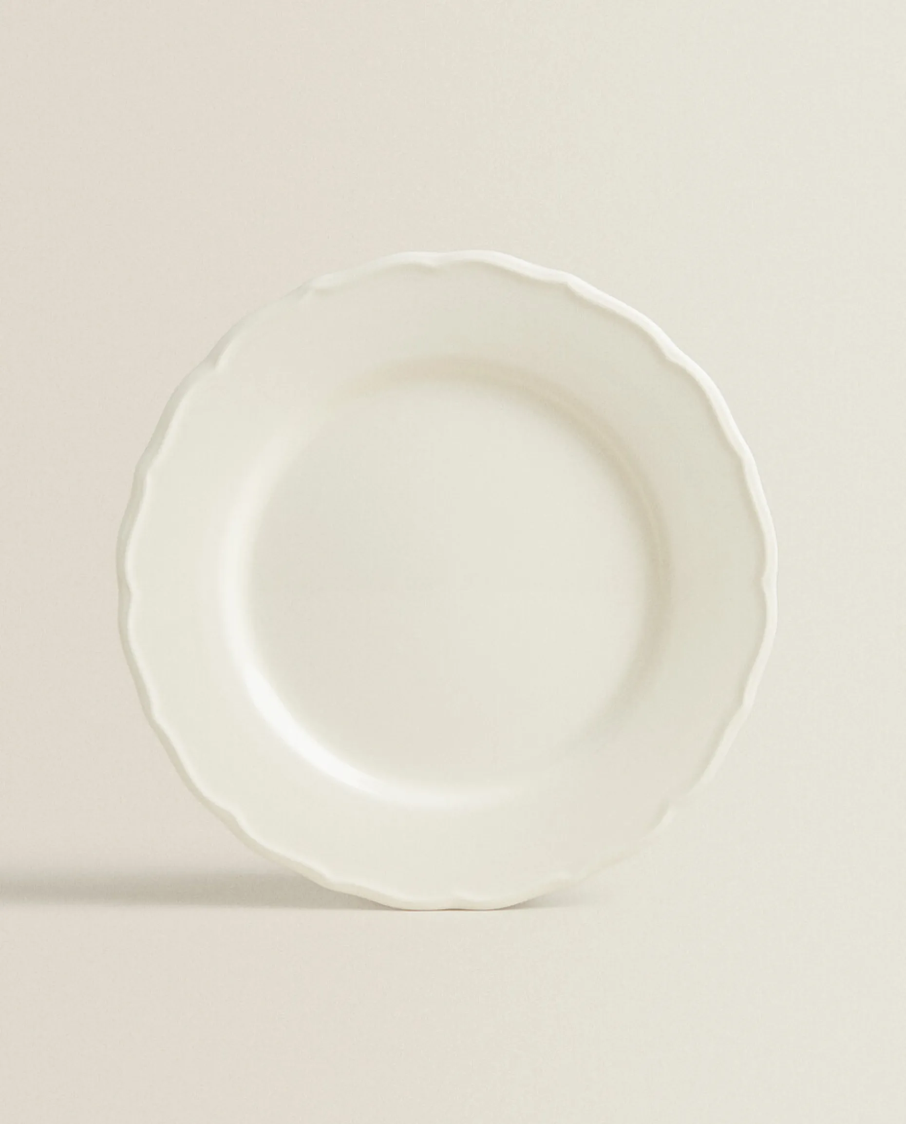 Earthenware Dinner Dish With Raised-Design Edge