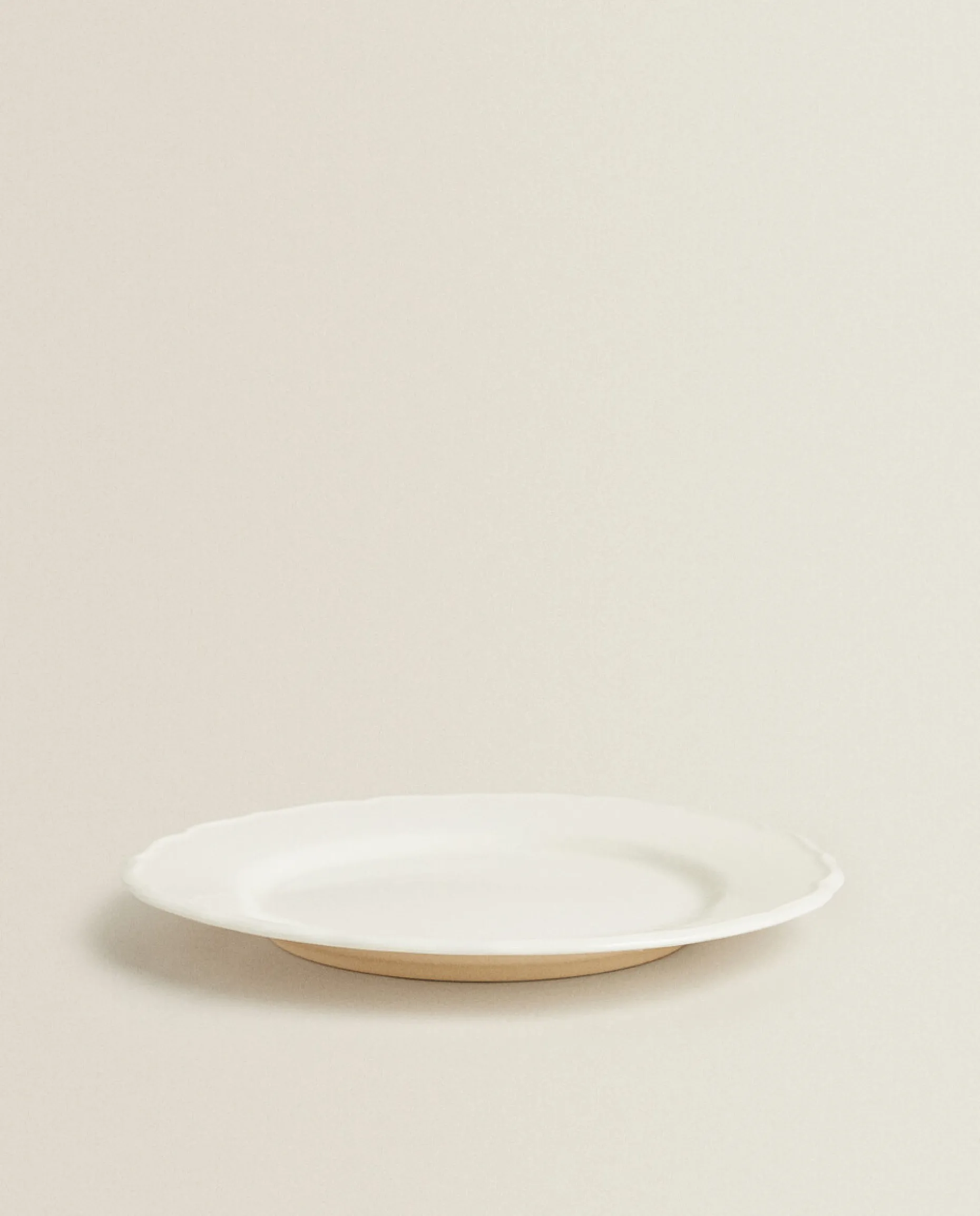 Earthenware Dinner Dish With Raised-Design Edge