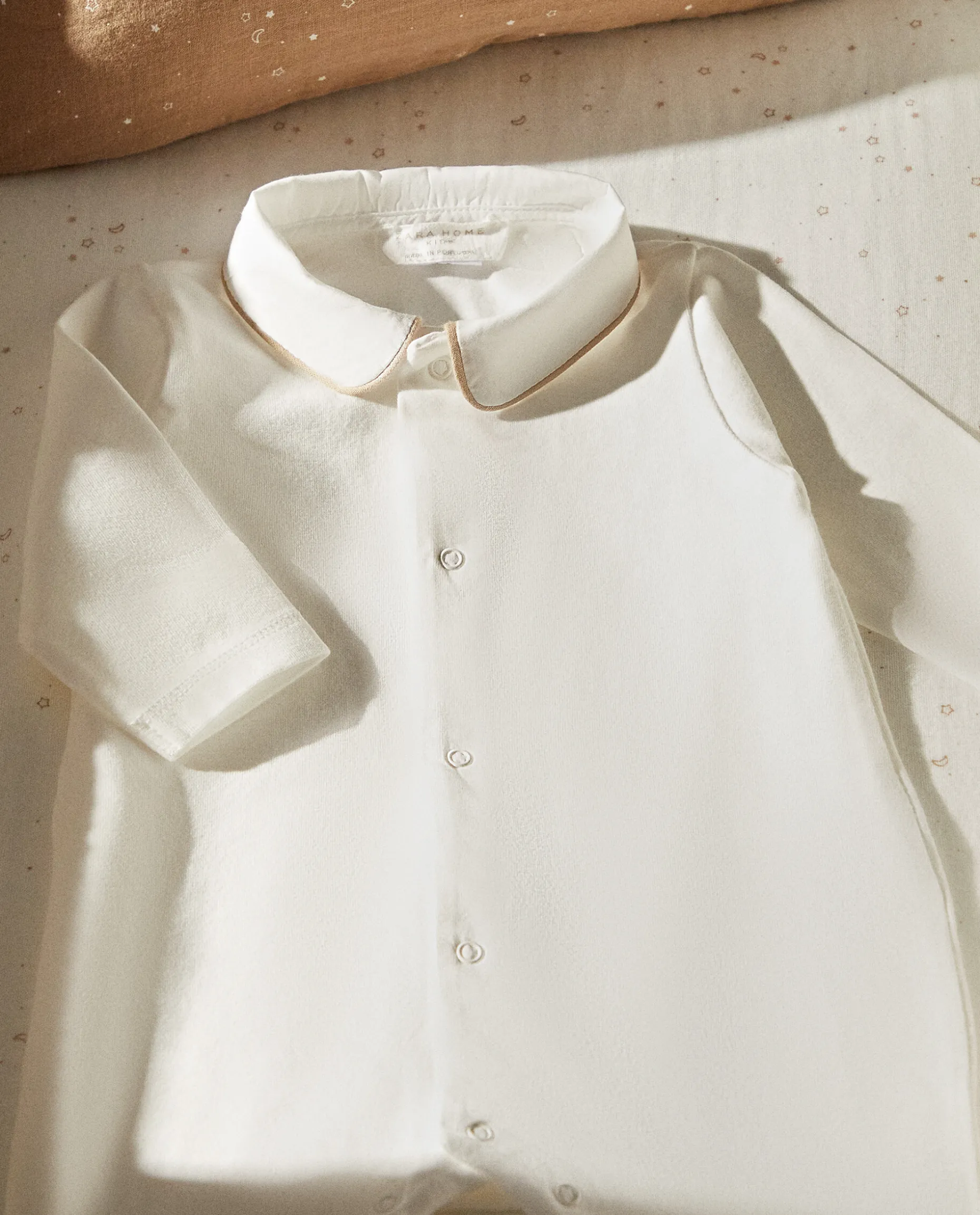 Footed Pajamas With Contrasting Piping