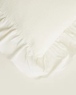 Throw Pillow With Ruffle Trim